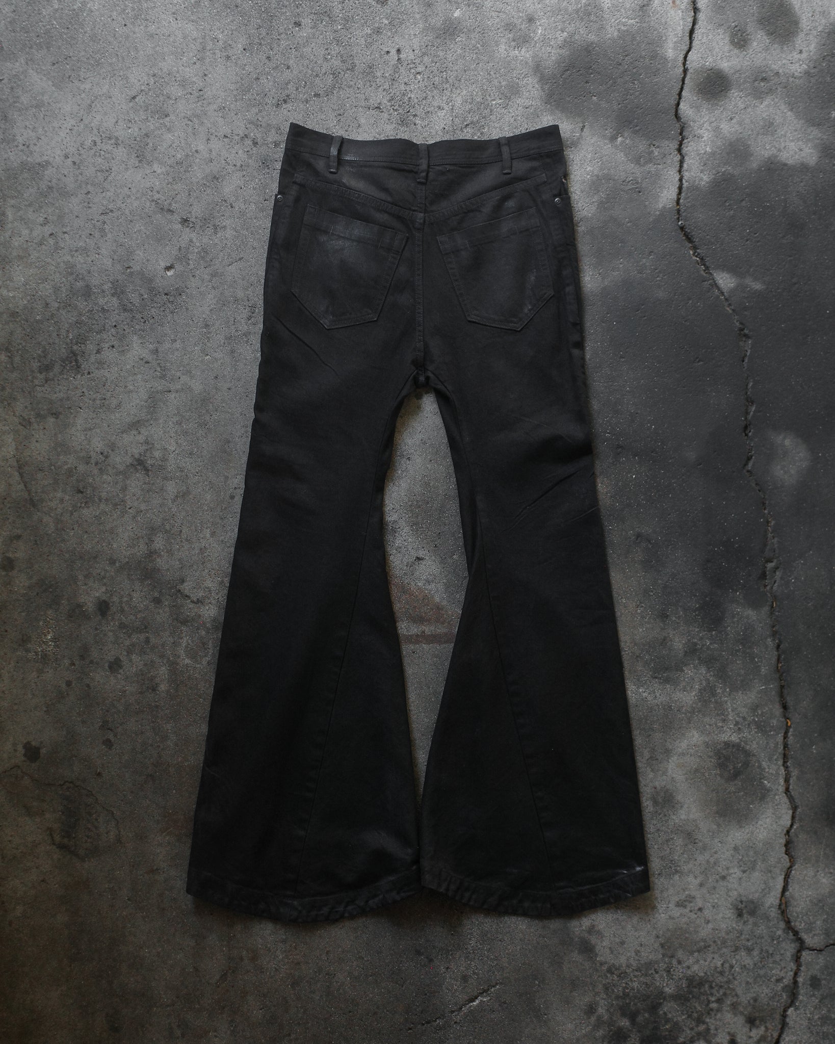 Julius SS25 Waxed Flared Jet Denim