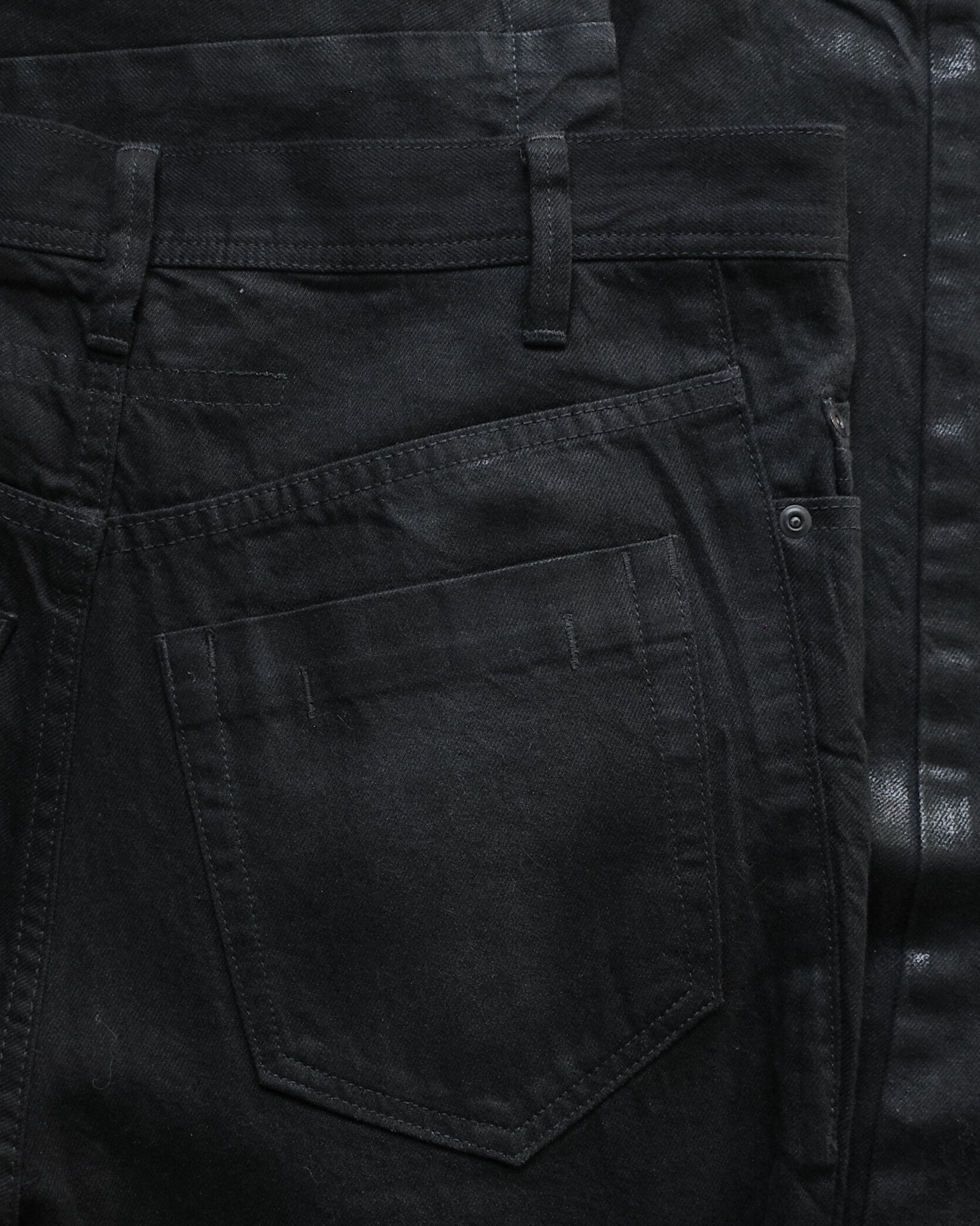 Julius SS25 Waxed Flared Jet Denim